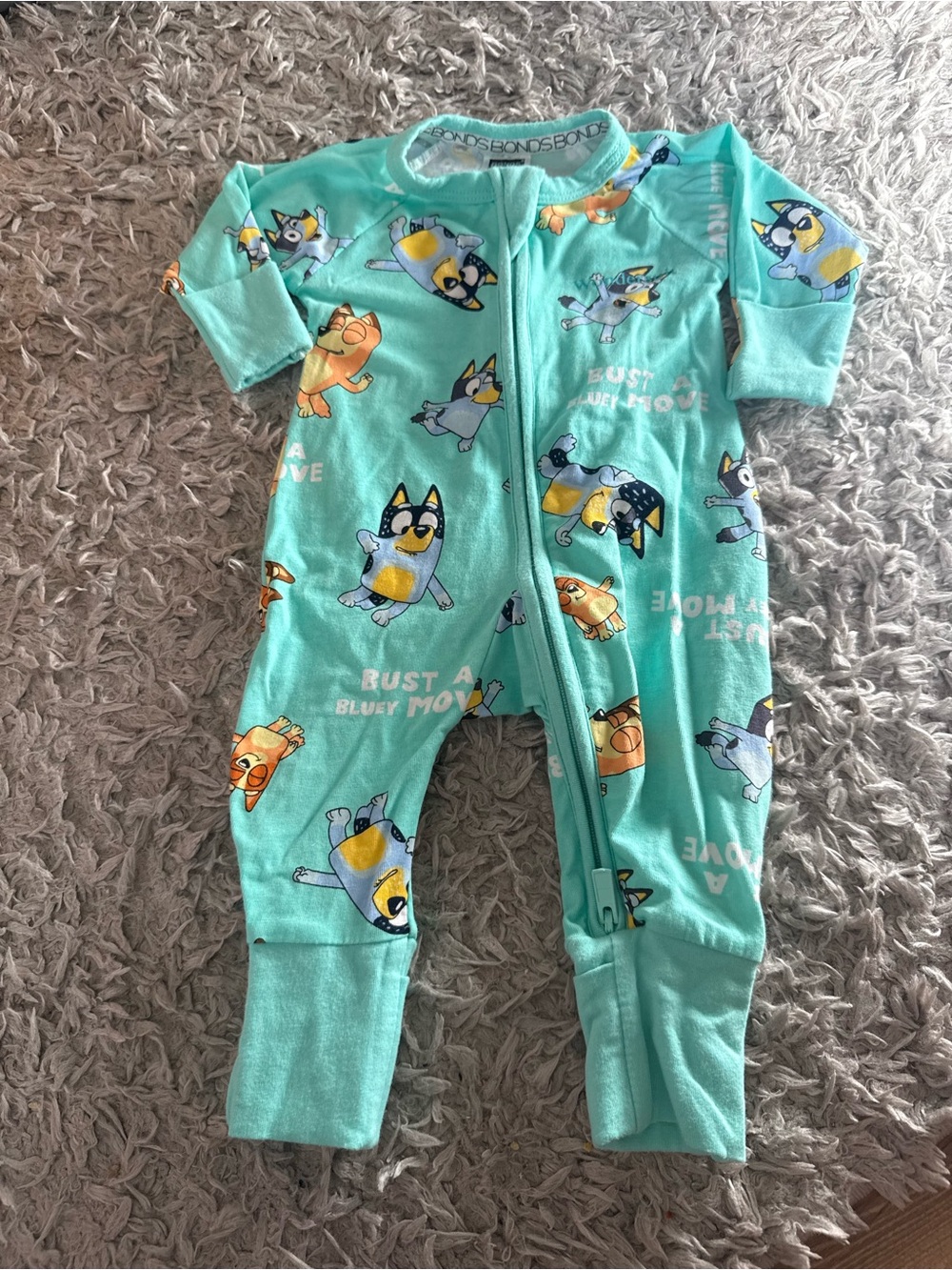 Bonds Teal Bluey Print Zip-One Piece with Yellow & Orange Accents